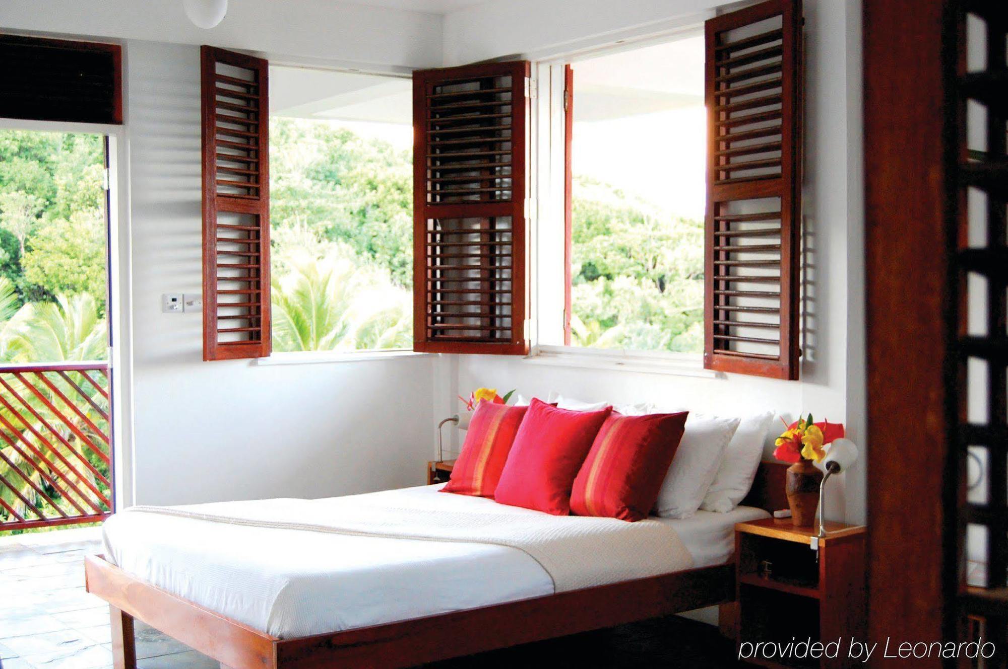 Calibishie Cove Hotel Quarto foto